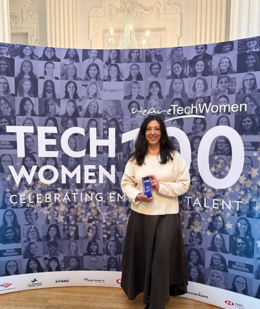 Bobbie King, SQEPtech co-founder and CEO, holding the TechWomen100 Company of the Year award at Mansion House, London